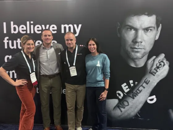 Picture of people from Team Gleason and Acapela Group to celebrate partnership renewal - At ASHA 2025