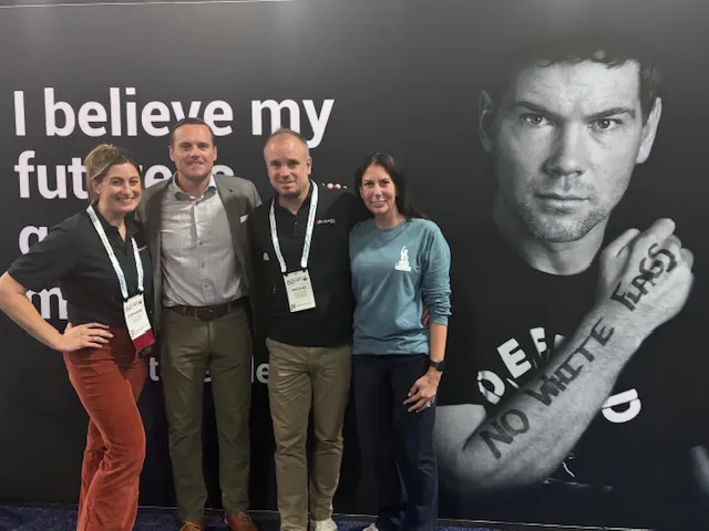 Picture of people from Team Gleason and Acapela Group to celebrate partnership renewal - At ASHA 2025